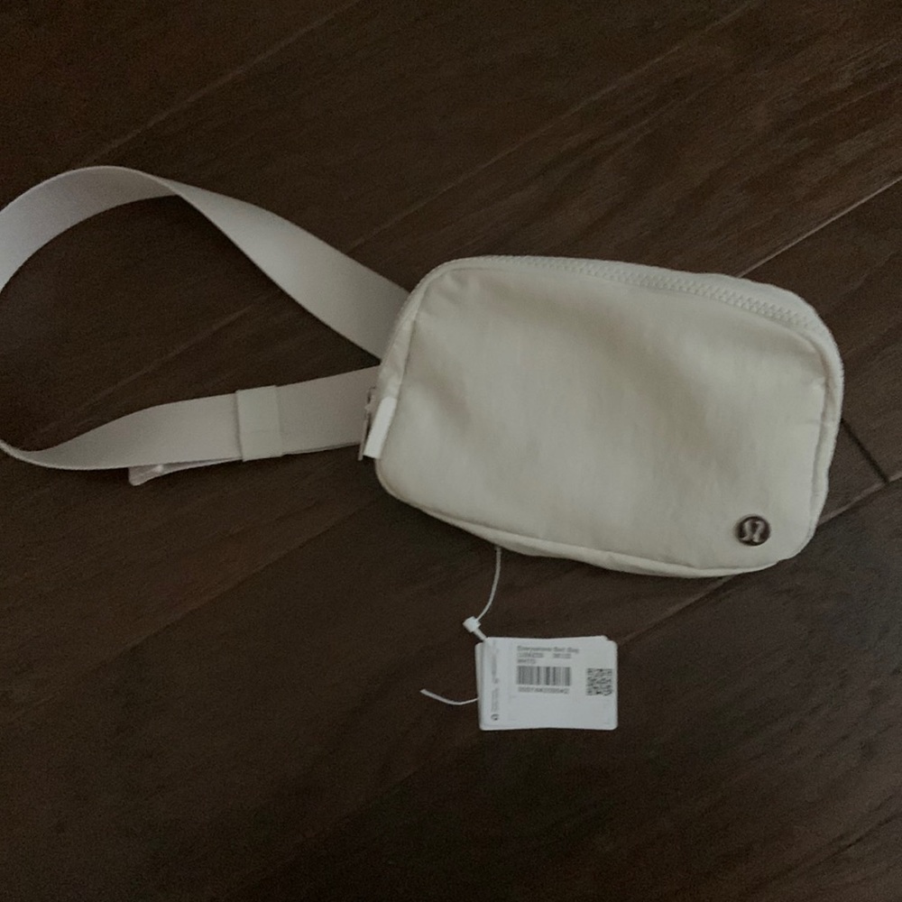 MUST GO! NWT Lululemon White opal belt bag!